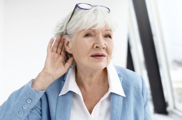 Woman Gesturing for you to speak up